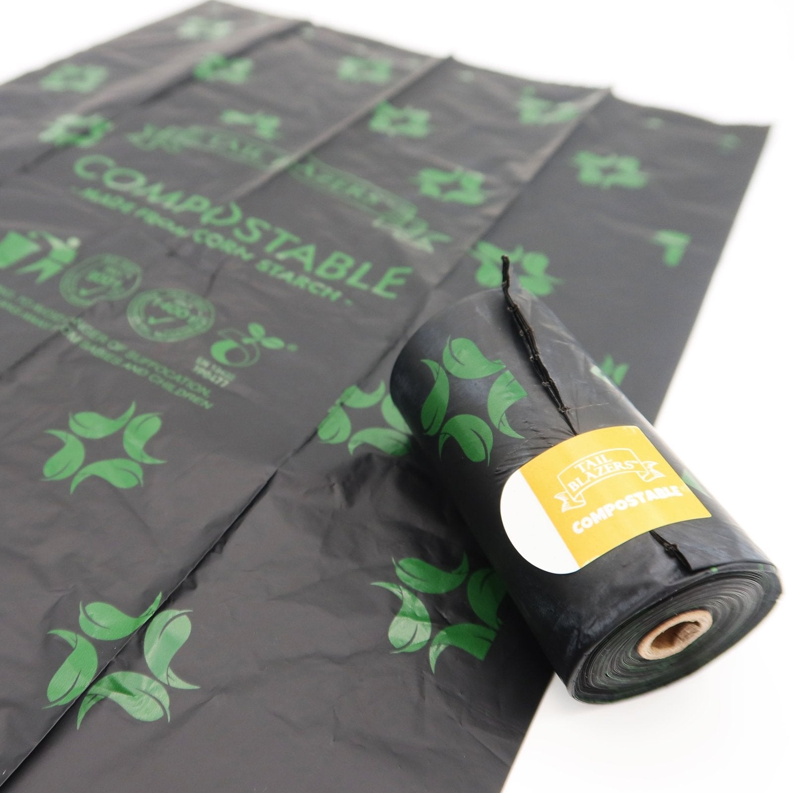 Compostable dog poop bags roll on white background