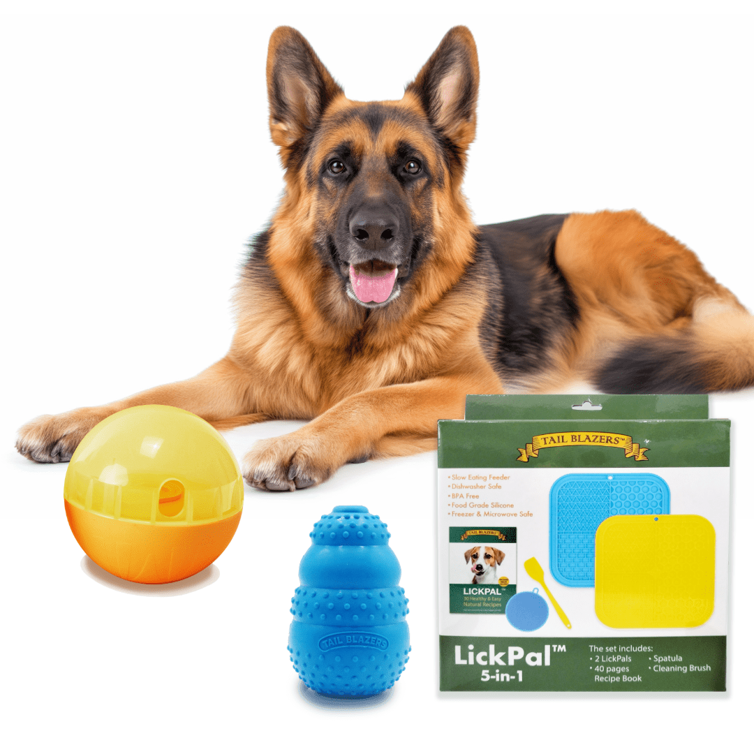 A German Shepherd Dog with a few dog products: treat ball, tuff chewer and the lick mat set