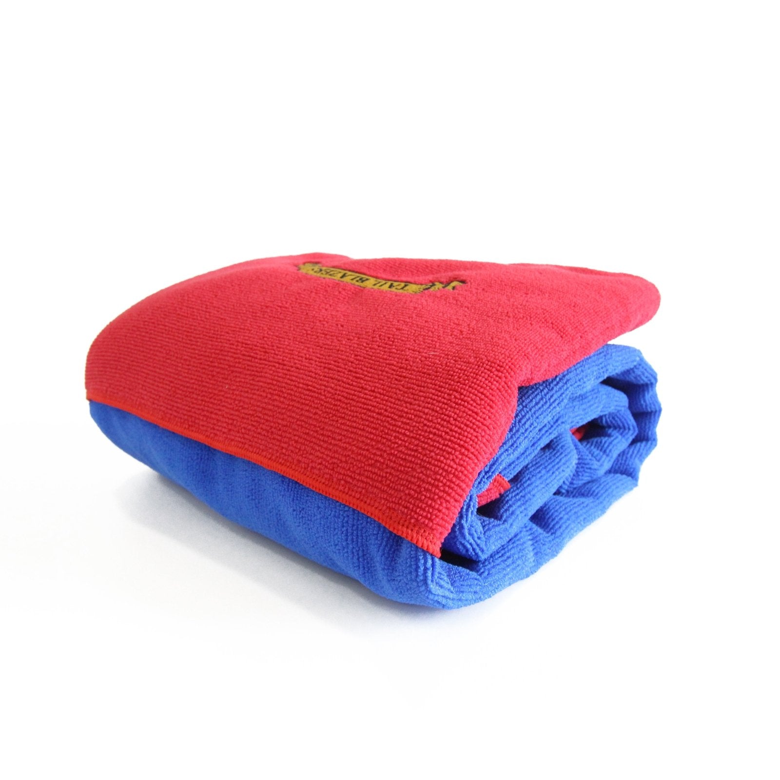 Folded dog drying towel blue and red on white background